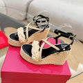 GARAVANI ROCKSTUD WEDGE SANDALS IN BLACK CALFSKIN AND BEIGE RAFFIA