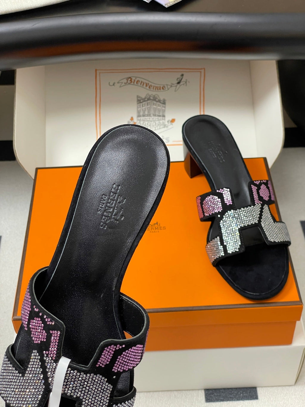 HERMES 25S ORAN HIGH‑HEEL SANDAL 50 MM IN BLACK LAMBSKIN WITH WHITE MIX PINK STONE DETAILS