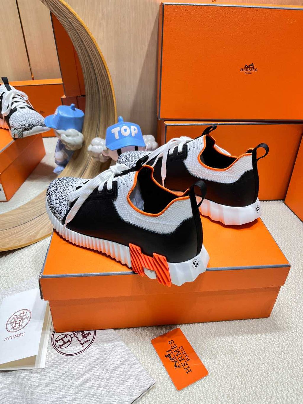 HERMES DEPART SLIP-ON SNEAKER IN WHITE MIX BLACK KNIT AND BLACK CALFSKIN